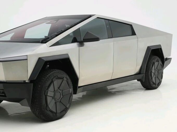 頂住壓力徹底取消門把手,特斯拉全新門把手專利曝光,風阻安全如何選? 圖片